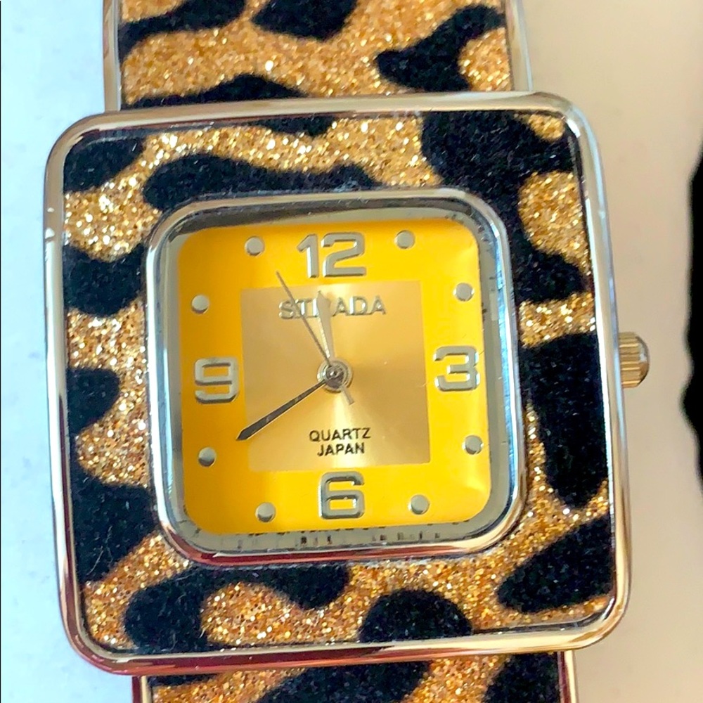 Strada watch animal print cuff silvertone euc